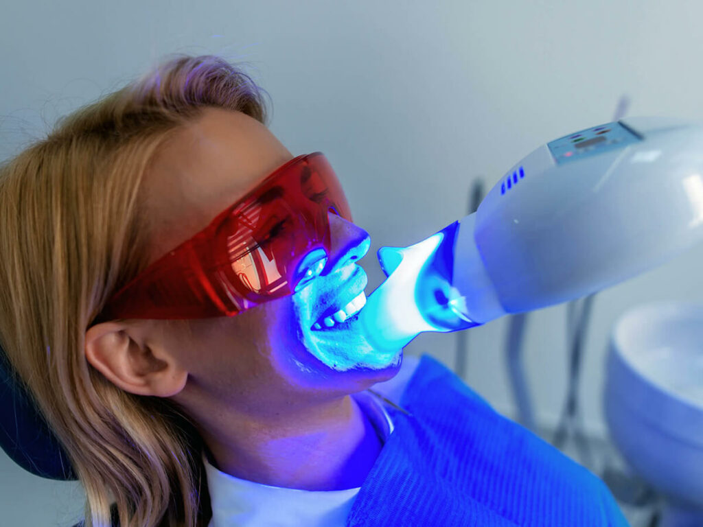 picture of woman getting teeth whitened