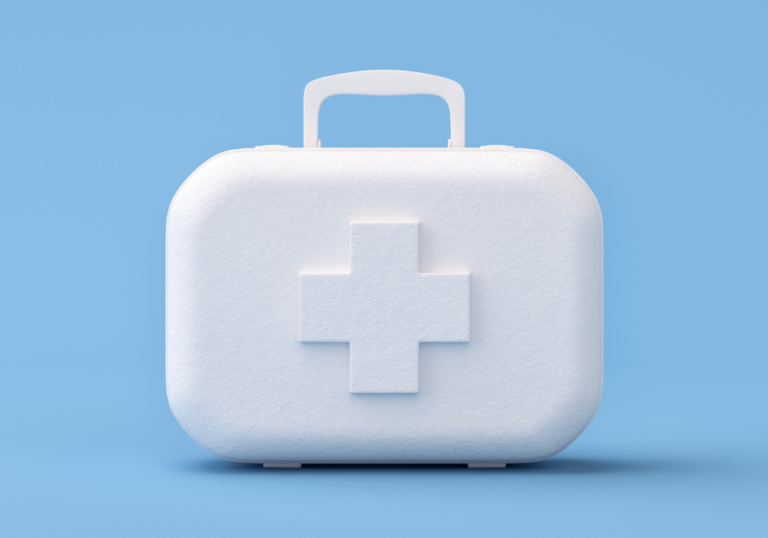 The image shows a picture of white first aid kit on a blue background.