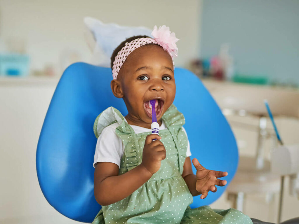 picture of child with tooth brush in mouth